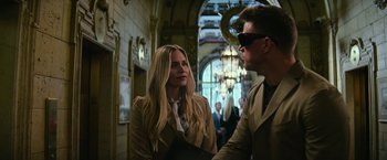 Movie still from “Dog” (2022), directed by Reid Carolin – A man and a woman are standing in a hallway; Close Up shot, Over the shoulder angle