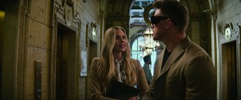 Movie still from “Dog” (2022), directed by Reid Carolin – A man and a woman are standing in a hallway; Close Up shot, Over the shoulder angle