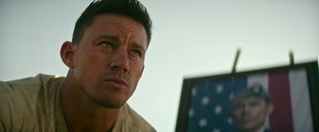 Movie still from “Dog” (2022), directed by Reid Carolin – A man's face looking into the distance; Close Up shot, Low angle