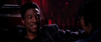 Movie still from “Dreamgirls” (2006), directed by Bill Condon – A person wearing a jacket; Close Up shot, Over the shoulder angle