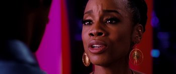 Movie still from “Dreamgirls” (2006), directed by Bill Condon – A person with short black hair; Close Up shot, Over the shoulder angle