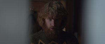 Movie still from “Frank” (2014), directed by Lenny Abrahamson – A person with a beard; Close Up shot, Low angle