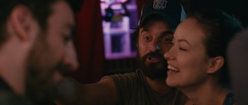 Movie still from “Drinking Buddies” (2013), directed by Joe Swanberg – A man and a woman taking a selfie in front of a window; Close Up shot, Over the shoulder angle