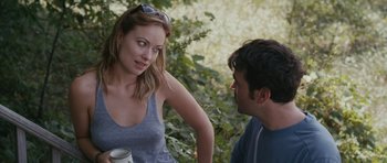 Movie still from “Drinking Buddies” (2013), directed by Joe Swanberg – A man and a woman talking to each other outside; Medium shot, Over the shoulder angle
