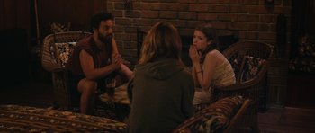 Movie still from “Drinking Buddies” (2013), directed by Joe Swanberg – A group of people sitting around a table; Medium shot, Over the shoulder angle