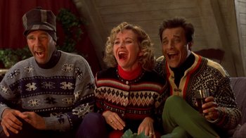 Movie still from “Dumb and Dumber” (1994), directed by Peter Farrelly – A group of people sitting next to each other on a couch; Medium shot, Low angle