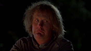 Movie still from “Dumb and Dumber” (1994), directed by Peter Farrelly – A person wearing a jacket; Close Up shot, Low angle