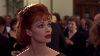 Movie still from “Dumb and Dumber” (1994), directed by Peter Farrelly – A person wearing a dress; Close Up shot, Over the shoulder angle