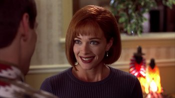 Movie still from “Dumb and Dumber” (1994), directed by Peter Farrelly – A person with short red hair; Close Up shot, Over the shoulder angle