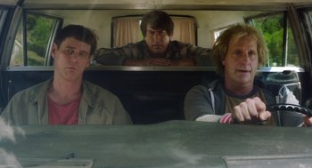 Movie still from “Dumb and Dumber To” (2014), directed by Peter Farrelly – Three men are sitting in the back of a van; Medium shot, Low angle