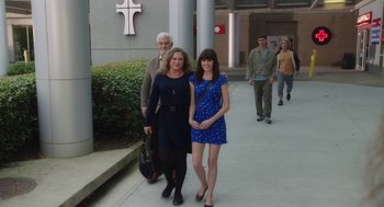 Movie still from “Dumb and Dumber To” (2014), directed by Peter Farrelly – Two women and an older man walk down a sidewalk; Wide shot, High angle