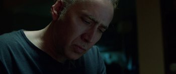 Movie still from “Dying of the Light” (2014), directed by Paul Schrader – A person wearing a tie; Close Up shot, Low angle