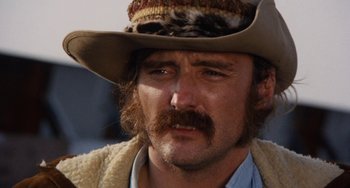 Movie still from “Easy Rider” (1969), directed by Dennis Hopper – A person wearing a cowboy hat; Close Up shot, Low angle
