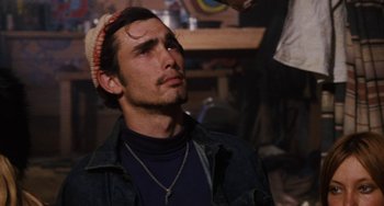 Movie still from “Easy Rider” (1969), directed by Dennis Hopper – A person wearing a hat; Close Up shot, Low angle