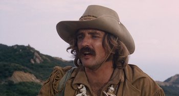Movie still from “Easy Rider” (1969), directed by Dennis Hopper – A person wearing a cowboy hat; Close Up shot, Low angle