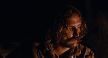 Movie still from “Easy Rider” (1969), directed by Dennis Hopper – A person with long curly hair; Close Up shot, Low angle