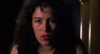 Movie still from “El Mariachi” (1992), directed by Robert Rodriguez – A person wearing a black shirt; Close Up shot, Low angle