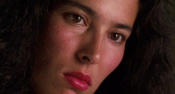 Movie still from “El Mariachi” (1992), directed by Robert Rodriguez – A woman's eyes and lips; Extreme Close Up shot, High angle