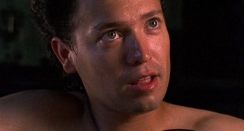 Movie still from “El Mariachi” (1992), directed by Robert Rodriguez – A man's face in a dark room; Extreme Close Up shot, High angle