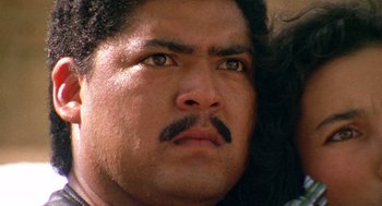 Movie still from “El Mariachi” (1992), directed by Robert Rodriguez – A person with a mustache; Close Up shot, Low angle