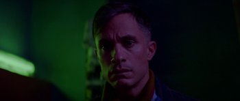 Movie still from “Ema” (2019), directed by Pablo Larraín – A person in a dark room; Close Up shot, Low angle