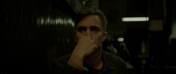 Movie still from “Ema” (2019), directed by Pablo Larraín – A man with his hand over his face; Close Up shot, Low angle