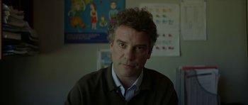 Movie still from “Ema” (2019), directed by Pablo Larraín – A person wearing a sweater; Close Up shot, Low angle