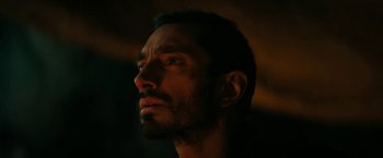 Movie still from “Encounter” (2021), directed by Michael Pearce – A person looking up at the sky; Close Up shot, Low angle