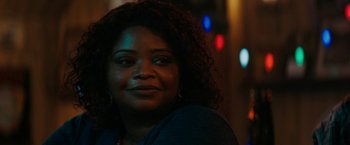 Movie still from “Encounter” (2021), directed by Michael Pearce – A person with curly hair; Close Up shot, Over the shoulder angle