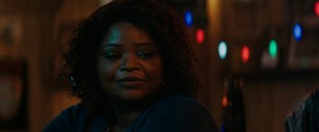 Movie still from “Encounter” (2021), directed by Michael Pearce – A person wearing a black shirt; Close Up shot, Over the shoulder angle