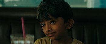 Movie still from “Encounter” (2021), directed by Michael Pearce – A young boy's face; Close Up shot, High angle