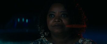 Movie still from “Encounter” (2021), directed by Michael Pearce – A person looking at the camera; Close Up shot, Over the shoulder angle