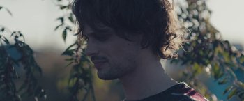 Movie still from “Endings, Beginnings” (2019), directed by Drake Doremus – A person with long hair; Close Up shot, Over the shoulder angle