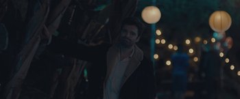 Movie still from “Endings, Beginnings” (2019), directed by Drake Doremus – A man standing in front of a tree at night; Medium shot, Over the shoulder angle