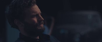 Movie still from “Endings, Beginnings” (2019), directed by Drake Doremus – A person with a beard; Close Up shot, Over the shoulder angle