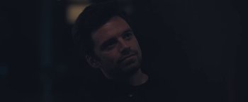 Movie still from “Endings, Beginnings” (2019), directed by Drake Doremus – A person in a dark room; Close Up shot, Over the shoulder angle