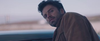 Movie still from “Endings, Beginnings” (2019), directed by Drake Doremus – A person wearing a jacket; Close Up shot, Low angle