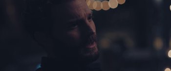 Movie still from “Endings, Beginnings” (2019), directed by Drake Doremus – A person with a beard; Close Up shot, Over the shoulder angle