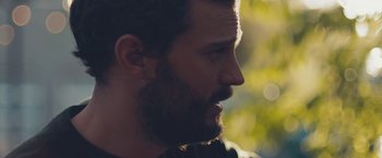 Movie still from “Endings, Beginnings” (2019), directed by Drake Doremus – A person with a beard; Close Up shot, Over the shoulder angle