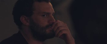 Movie still from “Endings, Beginnings” (2019), directed by Drake Doremus – A person with his hand under his chin; Close Up shot, Over the shoulder angle