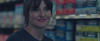Movie still from “Endings, Beginnings” (2019), directed by Drake Doremus – A person smiling for the camera; Close Up shot, Over the shoulder angle