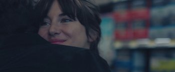 Movie still from “Endings, Beginnings” (2019), directed by Drake Doremus – A woman's face with her hands on her face; Extreme Close Up shot, Over the shoulder angle