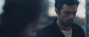 Movie still from “Endings, Beginnings” (2019), directed by Drake Doremus – A person wearing a black jacket; Close Up shot, Over the shoulder angle