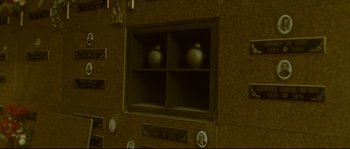 Movie still from “Enter the Void” (2009), directed by Gaspar Noé – A wall with a shelf and two vases on it; Extreme Close Up shot, High angle