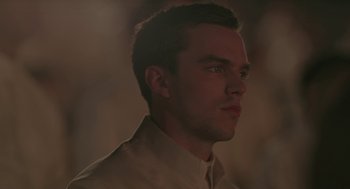 Movie still from “Equals” (2015), directed by Drake Doremus – A person wearing a dress shirt; Close Up shot, Over the shoulder angle