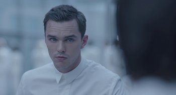 Movie still from “Equals” (2015), directed by Drake Doremus – A person wearing a white shirt; Close Up shot, Over the shoulder angle