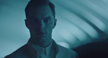 Movie still from “Equals” (2015), directed by Drake Doremus – A man in a white shirt and a white tie; Close Up shot, Low angle
