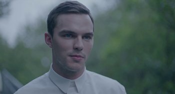 Movie still from “Equals” (2015), directed by Drake Doremus – A person wearing a white shirt; Close Up shot, Over the shoulder angle