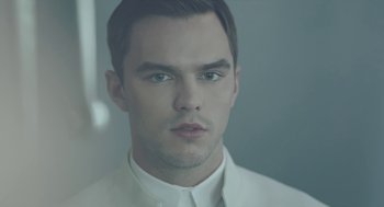 Movie still from “Equals” (2015), directed by Drake Doremus – A person wearing a white shirt; Close Up shot, Low angle