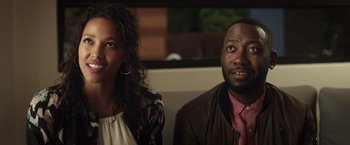 Movie still from “Game Night” (2018), directed by John Francis Daley – A man and a woman sitting next to each other; Close Up shot, Over the shoulder angle